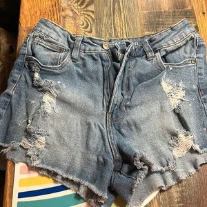 Distressed denim shorts